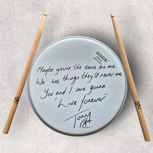 Signed Tony McCarroll Drum Skin & Sticks Set - Live Forever lyrics